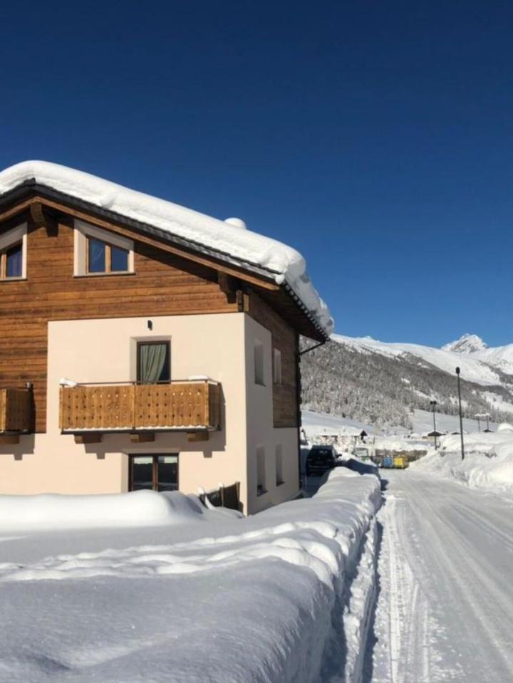 Two-Bedroom Deluxe Apartment with Balcony (1 sofa bed, Bedroom#1: 2 single beds, Bedroom#2: 2 single beds) - Free WiFi – Appartamento Livigno