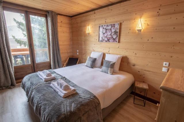 Chalet Magique - Luxury Catered Chalet - 4 En-Suite Bedrooms - Sauna - Private Home Cinema - Ideal Location in Center of Alpe D'huez - 10 People – billede 7