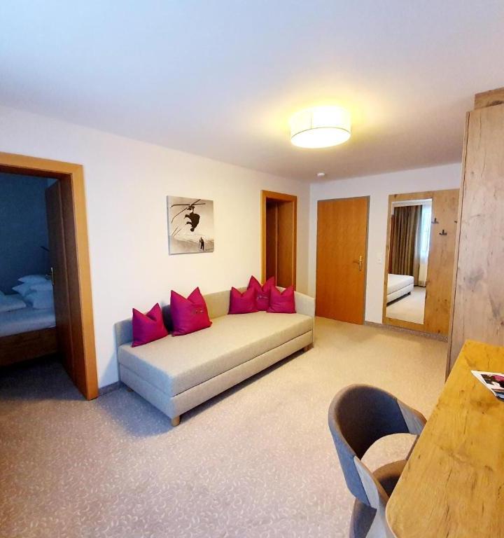 Familiesuite med balkon – Austria Alpinhotel