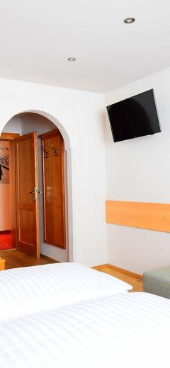 Dobbeltværelse 2+1 pers. – Austria Alpinhotel