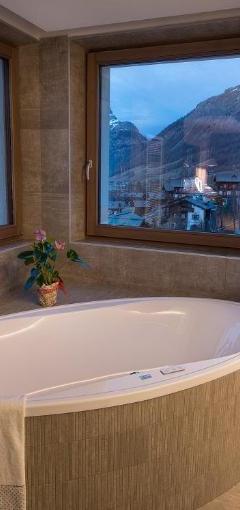 Suite med spabad, sauna og balkon – Baita Montana