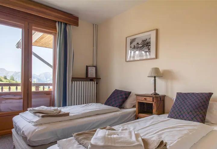 Quadruple, 4 singles w. balcony – Hotel Le Chamois