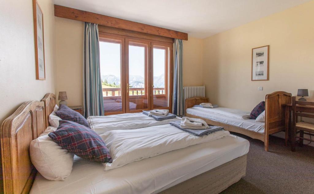Tripleværelse med balkon max 3 pers. – Hotel Le Chamois